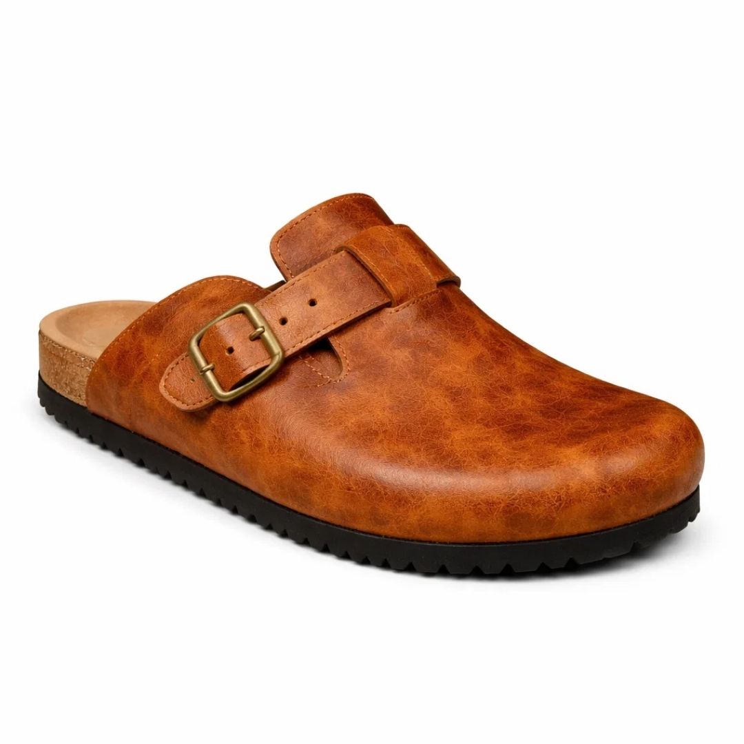 Brown leather clog shoe with a buckle on a white background