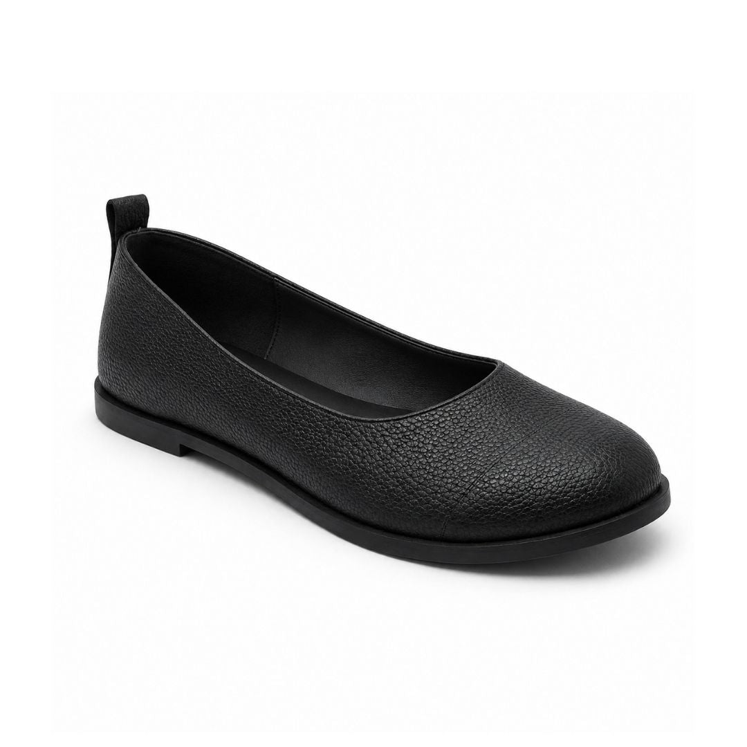Black leather flat shoe on a white background
