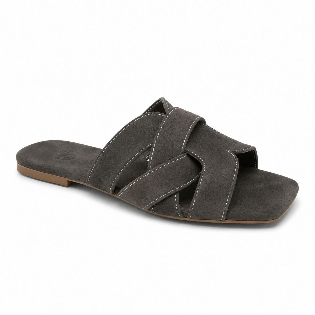 Gray sandal with crisscross straps on a white background
