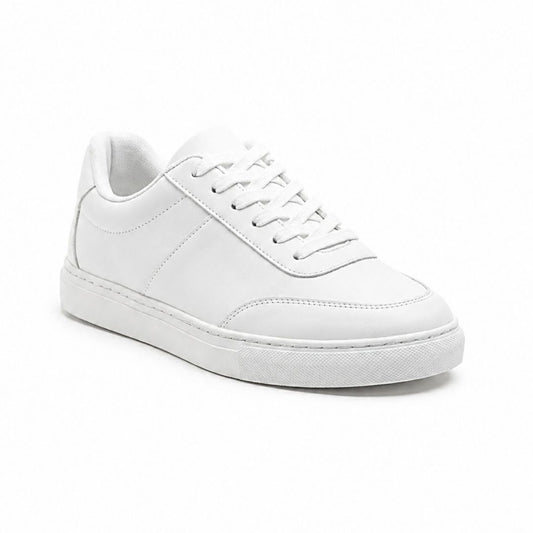 A clean white leather low-top sneaker with matching white laces and a thick white rubber sole, shown from a three-quarters angle on a white background.