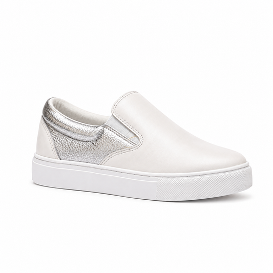 A white slip-on sneaker with a textured metallic silver heel panel, shown from a side profile on a clean white background.