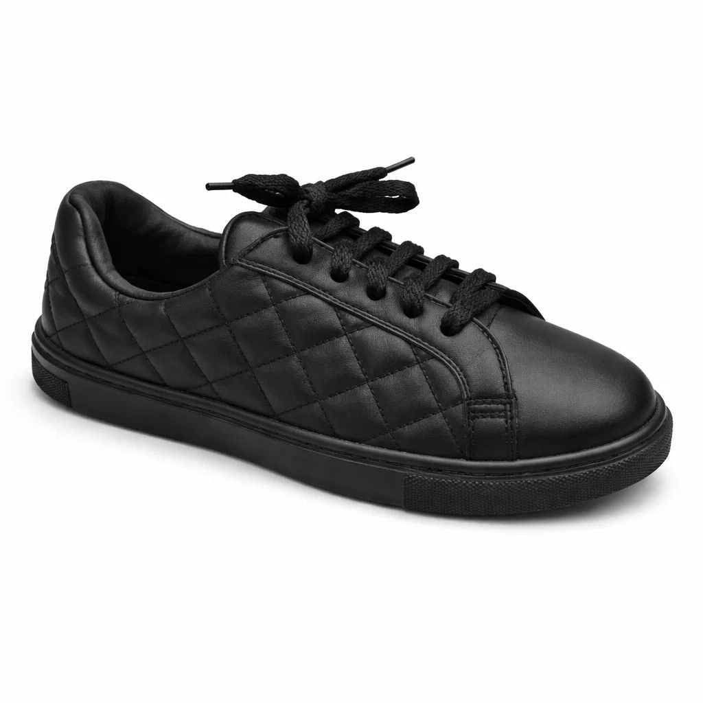 Black quilted sneaker on a white background