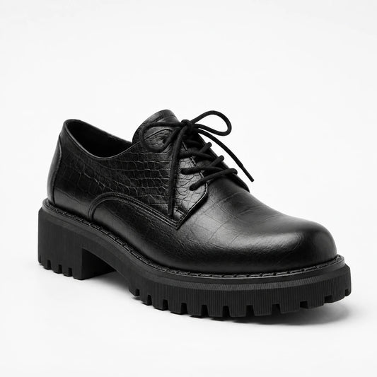 A single black leather lace-up oxford shoe with a textured crocodile-embossed upper, black laces, and a chunky lug sole, shown on a clean white background.