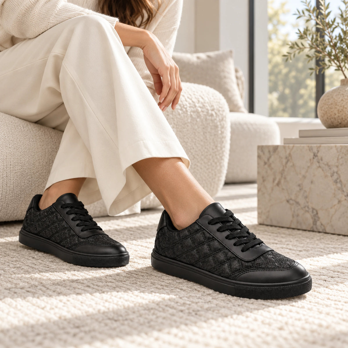 Black quilted sneaker lifestyle shot 2