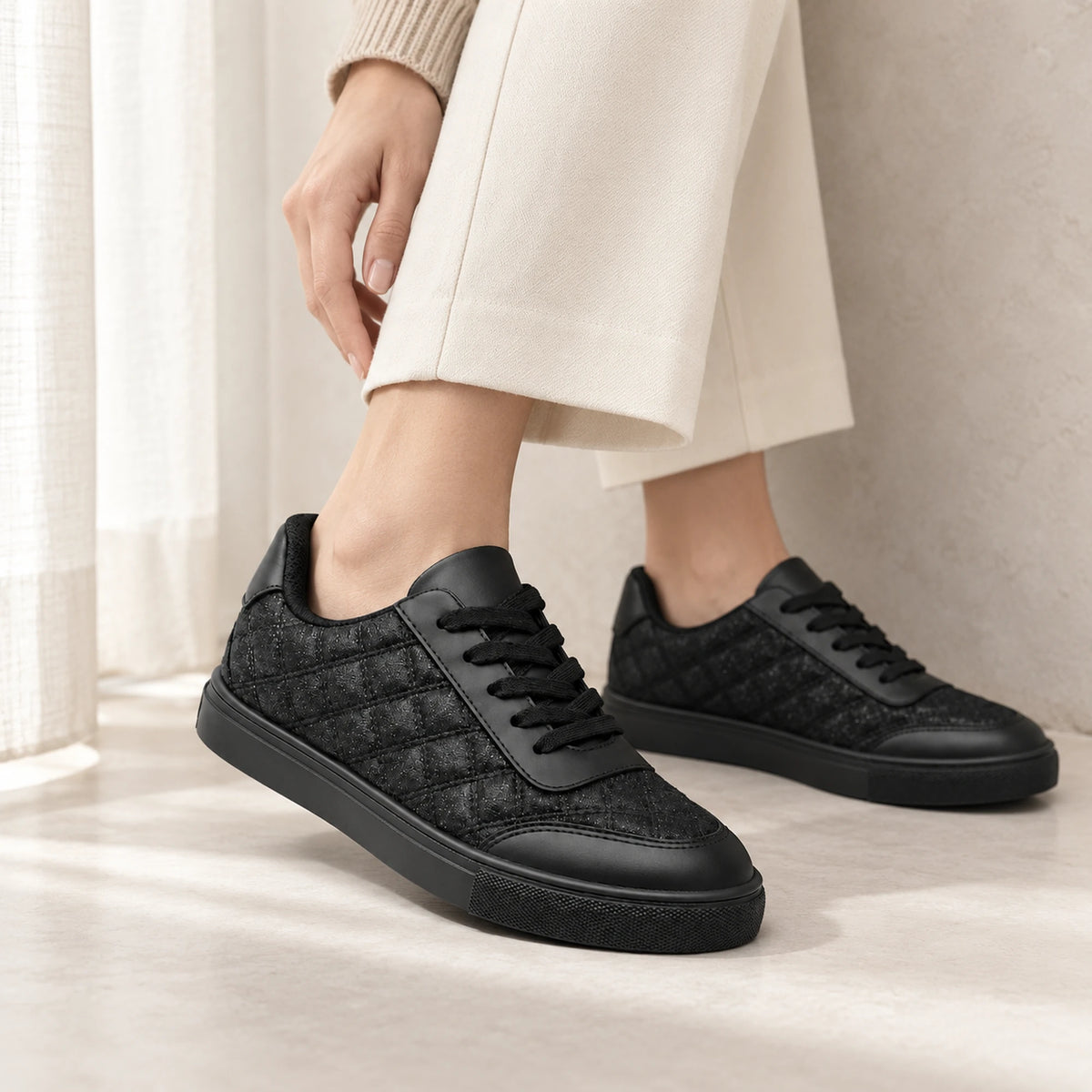 Black quilted sneaker lifestyle shot 5