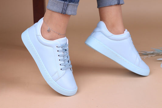 Colorful women's sneakers, the same color as the sole. Buy now women's sneakers in light blue color and light blue sole