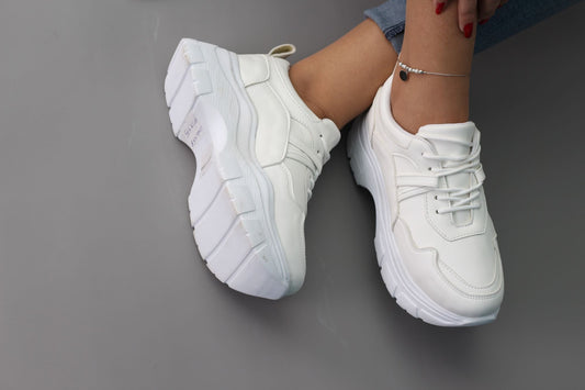 Women's white leather high-sole sneakers. Lightweight sneakers for ease of movement designed to the satisfaction of all customers. solid template. Buy now stylish and comfortable sneakers from shoppingooo, suitable for all occasions