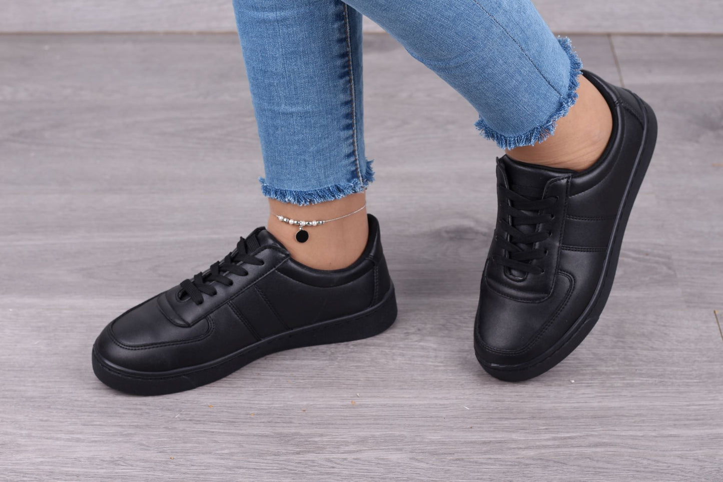 Buy now comfortable and padded black leather sneakers to be happier in your life